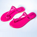 Pink knotted strap flats